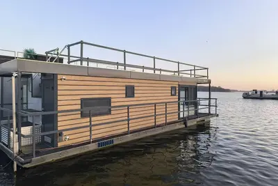 Image de Appartement 'Ferienwohnung Auf Dem See' avec vue sur lac, terrasse partagée et climatisation