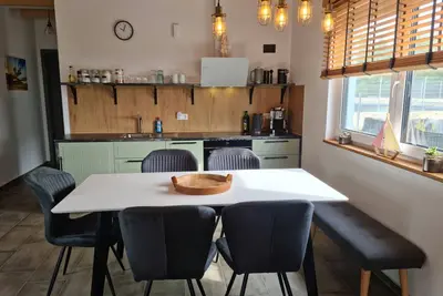 Image de Ferienhaus Strandkaue Bergheider See - Grubenlampe