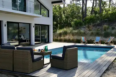 Image de Villa Océandes : pieds dans le sable, 300 m de l'océan, 12 per, piscine chauffée