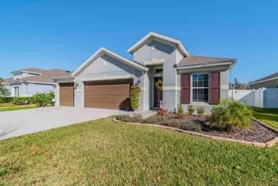 Image de Spacious house in Wesley Chapel\/ Sleeps 10\/fenced yard
