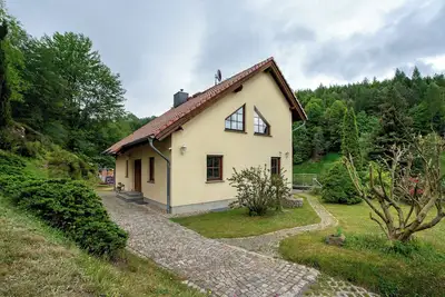 Image de Maison de vacances 'Ferienhaus 'zum Zaunkönig'' avec terrasse privée, jardin privé et Wi-Fi