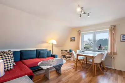 Image de Appartement \"Westerland Kampstraße Obergeschoss\" avec jardin privé et Wi-Fi