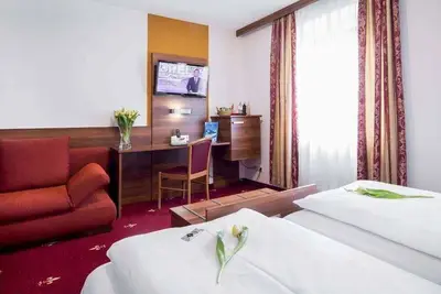Image de Four-bed room - Hotel Burgschmiet GmbH