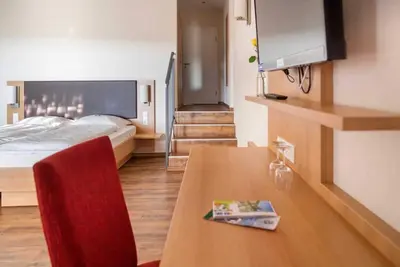 Image de Familienzimmer Samtrot fĂĽr 1-4 Personen - Ferienhof Laurentius