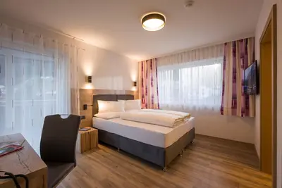 Image de Doppelzimmer Hochzillertal 4 - Aparthotel Alptirol