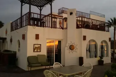 Image de Beautiful oceanfront villa - large terrace, bbq, fire pit, pool, jacuzzi, beach
