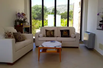 Image de Casa Pedra De Busca: surrounded by greenery