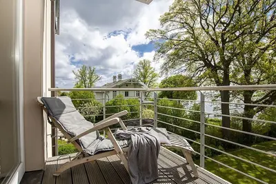 Image de Villa Nause Og2 - Meerblick, Sauna, Whirlpool, Kamin - Ferienwohnung - Og 2