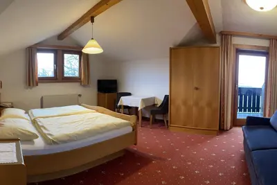 Image de Doppelzimmer Mansarde - Hotel Hemetsberger
