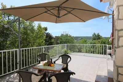 Image de Appartement de vacances avec climatisation et vue sur la mer