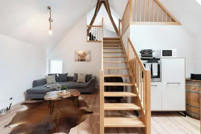 Image de Appartement 'Appartment Waldloft' avec vue sur les montagnes, terrasse privée et Wi-Fi