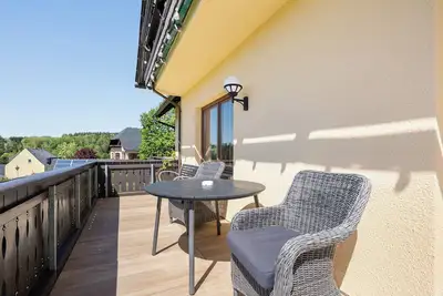 Image de Appartement 'Pension Bergblick - Schwarzwasserta' avec vue sur les montagnes, balcon et Wi-Fi