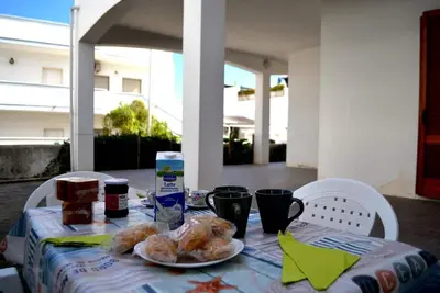 Image de Appartement 'Casa Nami Al Piano Terra A S Foca' avec jardin privé