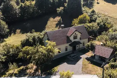 Image de Traditional old house in a peacefull small village, surrounded by green forests.