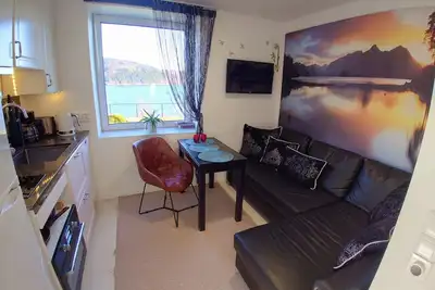 \"Bergen Sunrise\" Studio apartment on the Fjord. \nSelf check in; 1 free parking.