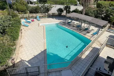 Image de L'Isula - Front de mer - Appt pour 5 climatisé avec piscine