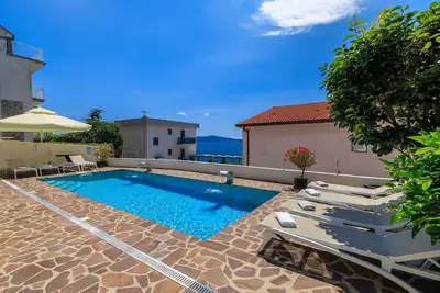 Image de A seulement 100 mètres de la plage avec piscine