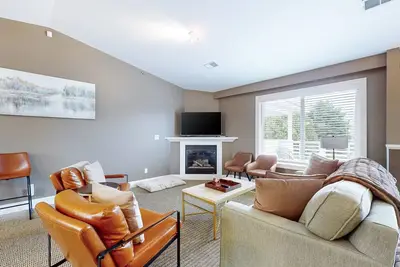 Stylish dog-friendly retreat with furnished deck, pool, & firepits