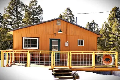 Image de Paws in the Pines, quaint romantic cabin, world class fishing, dog friendly