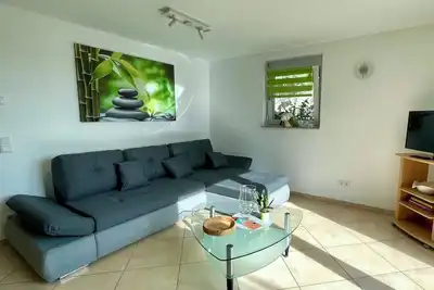 Image de Appartement 'Ferienwohnung Am Berg' avec vue sur les montagnes, terrasse privée et Wi-Fi