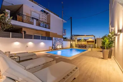 Image de Maison de vacances Kiotari pour 1 - 8 personnes avec 4 chambres à coucher - Maison de vacances