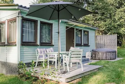 Image de Ferienhäuser Insel Usedom - Waldhaus 3 - Waldgrundstück Direkt am Achterwasser!