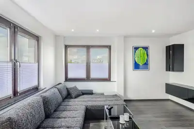 Image de Appartement \"Moin, Die Ferienwohnung\" avec sa propre petite prairie et Wi-Fi