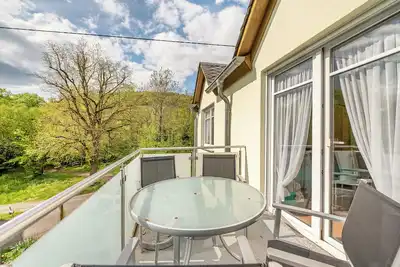 Image de Appartement 'Gästehaus Mühlenhof - Riesling' avec terrasse privée, jardin privé et Wi-Fi