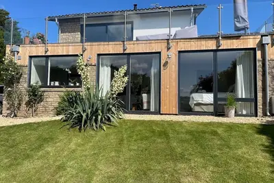 Image de Stylish, light and airy property with wonderful views and garden.