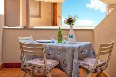 Image de Appartement 'Casa Sara Lu Bagnu' avec terrasse privée et balcon