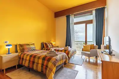 Image de Chambre 'Stanza Miele' avec vue sur la montagne, terrasse partagée et Wi-Fi