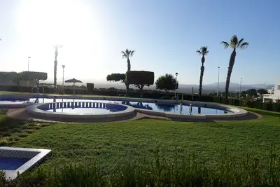 Image de Two bedroom first floor apartment, Airconditioning, Wifi, communal pool.