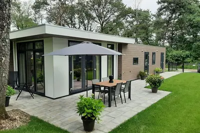 Image de Gezellig Chalet met Omheinde Tuin