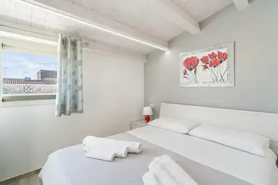 Image de Maison de vacances 'La Casa Del Corso' avec terrasse privée, Wi-Fi et climatisation