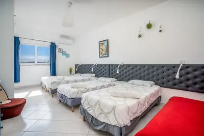 Image de Chambre 'Praia Grande' avec piscine partagée, Wi-Fi et climatisation