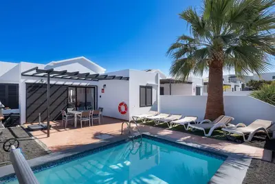 Image de Maison de vacances 'Casa Rosa' avec vue sur la montagne, piscine privée et Wi-Fi