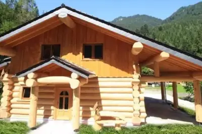 Image de Maison de vacances 'Seehaus Alm' avec vue sur les montagnes, terrasse privée et Wi-Fi