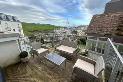 Image de Town centre flat near to Tunnels Beach and the harbour with a large Balcony!