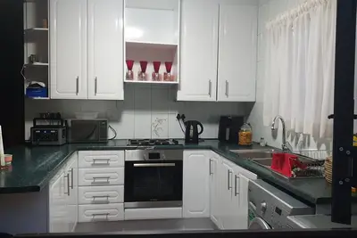 Image de Situated in a secure private estate in Midrand is this lovely double story home.