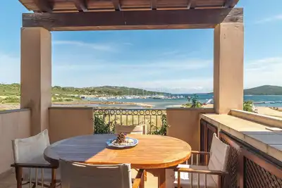 Image de Appartement 'I Mirti 20' avec vue sur la mer, terrasse privée et climatisation