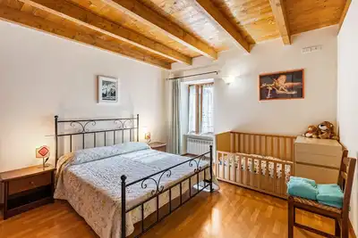 Image de Appartement 'Appartamento Trilocale' avec terrasse partagée, jardin partagé et Wi-Fi