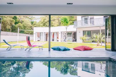 Image de Maison de vacances 'Villa Des Dunes' avec terrasse privée, Wi-Fi et climatisation