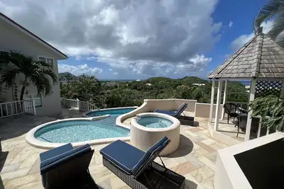 Image de The Ridge, Cap Estate- Sunset ocean views all year for up to 6 guests