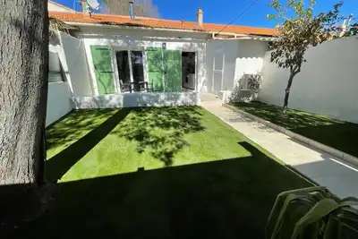 Image de Petite maison au calme avec jardin, clim, parking à 15min à pied du centre ville