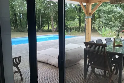 Image de Villa 170 m2, Soulac/mer 10 min. Terrain Arboré 3000m2 piscine privée /chauffée.