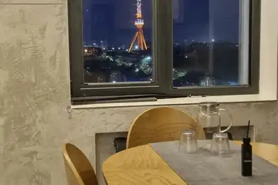 Image de A cozy and stylish apartment with its own terrace.