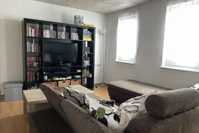 Image de GroĂźe und GemĂĽtliche Familienwohnung auf dem Land