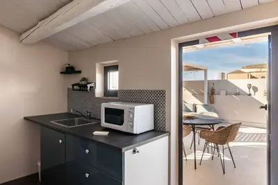 Image de Joli appartement pour 4 personnes avec Wifi, climatisation, Tv et patio