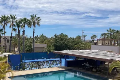 Miramar Villas Beautiful heated pool & pickleball court. Aime Sophia has it all!