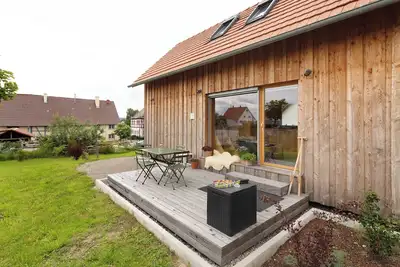 Image de Maison de vacances 'Tinyhaus Am Bussen' avec terrasse et jardin privés